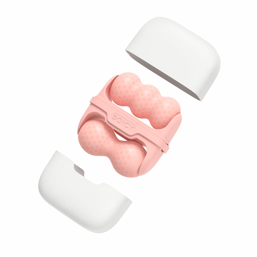 Ice Roller Soicy S30 en rose – rouleau facial ergonomique pour thérapie par le froid, massage et drainage lymphatique, présenté en position démontée avec un étui de rangement blanc.
