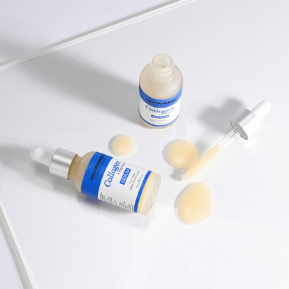 Neutriherbs Collagen + Peptides Serum 30 ml avec flacon ouvert, pipette et texture du sérum. Gros plan montrant la texture soyeuse et l’applicateur pipette pratique pour un dosage précis.